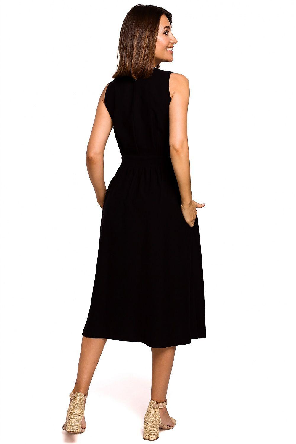 Black sleeveless V-neck day dress with gathered waist, back view