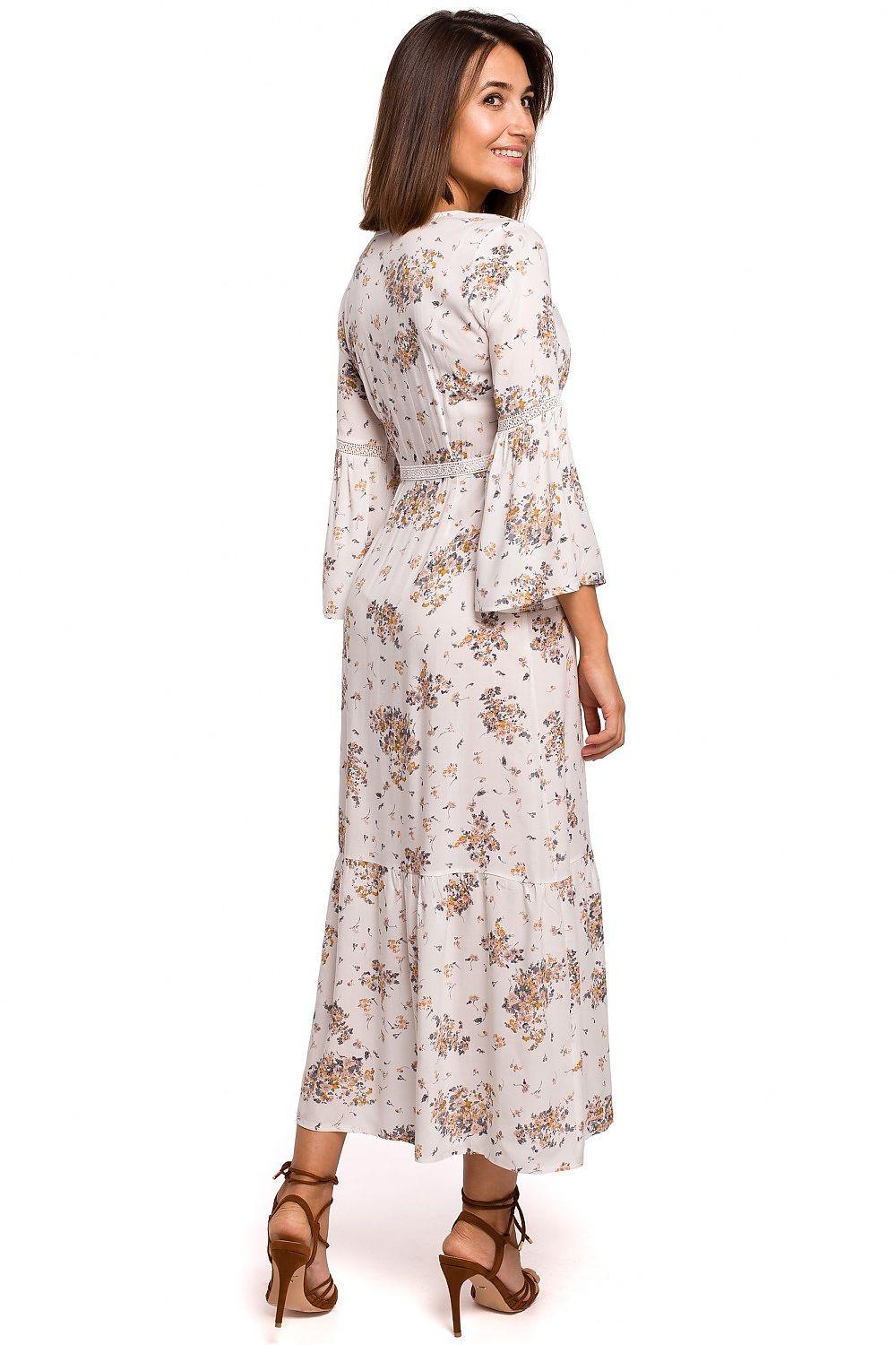 Beige floral daydress, back view, round neckline with three-quarter sleeves and waist belt