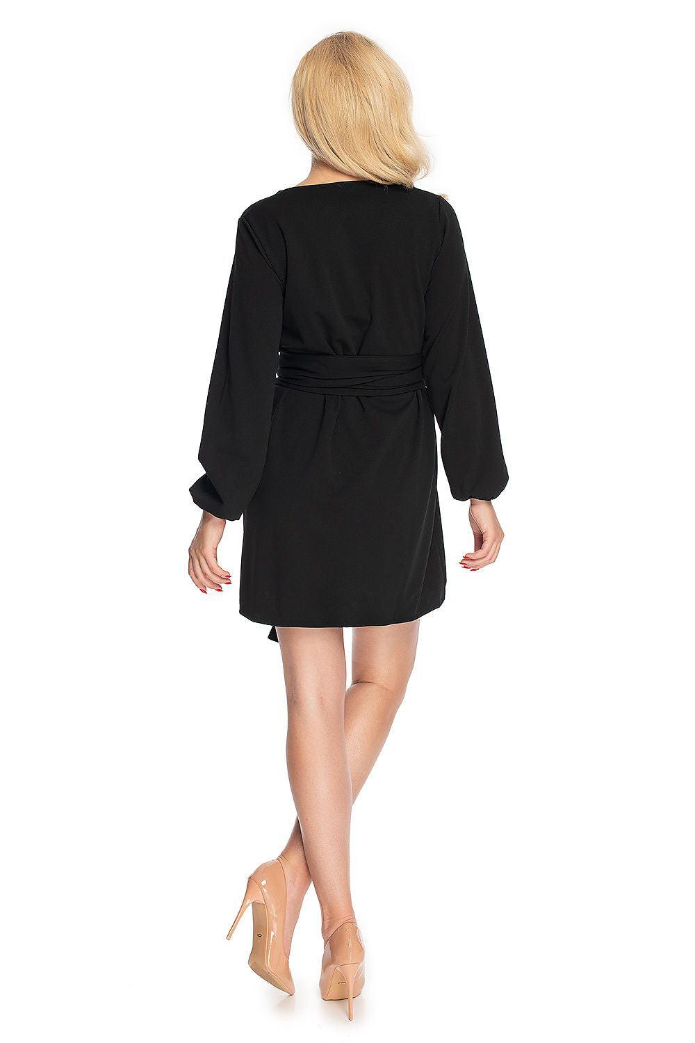 Black daydress back view with long sleeves and tied waist belt, above-knee length