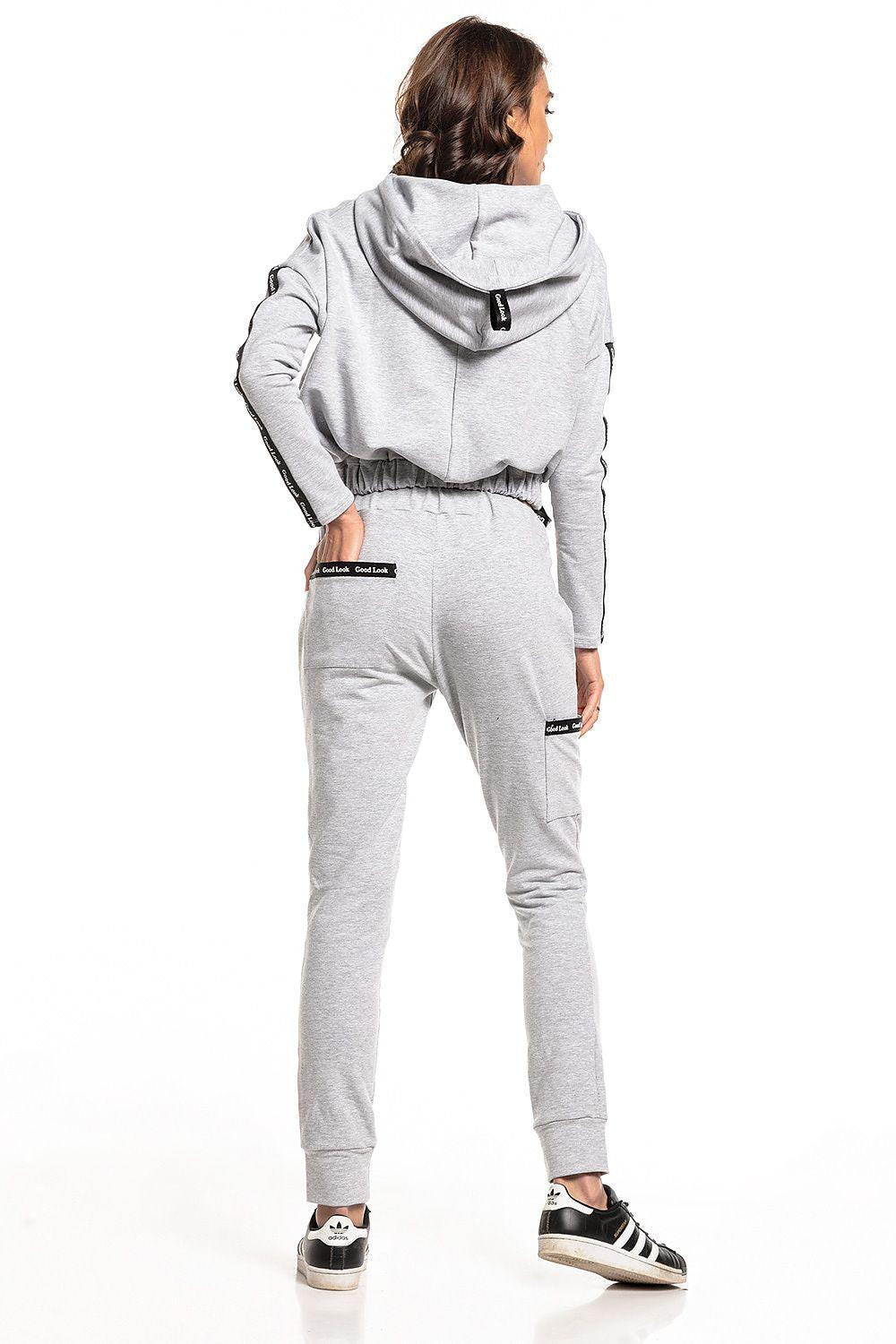 Light grey tracksuit trousers, rear view, with elastic cuffs and drawstring waist