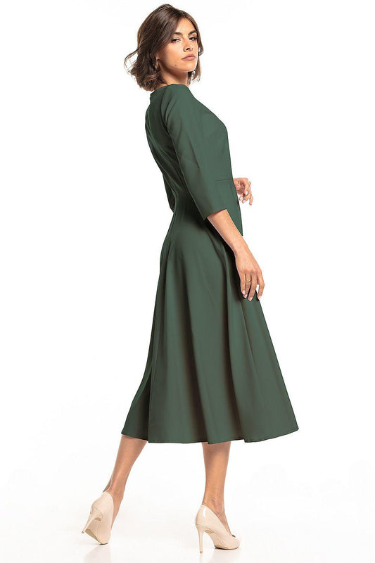 Dark green midi A-line daydress with 3/4 sleeves, round neckline, side view