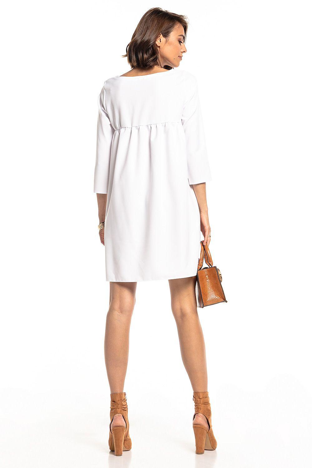 White daydress with 3/4 sleeves and gathered back yoke, above-knee length