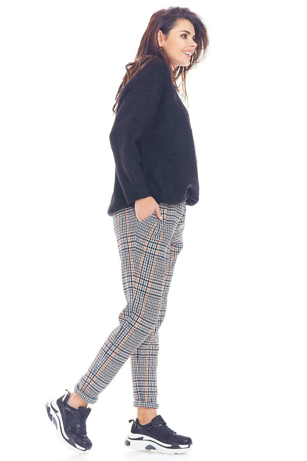 Women's plaid trousers, navy and white check, side profile, ankle cuffs