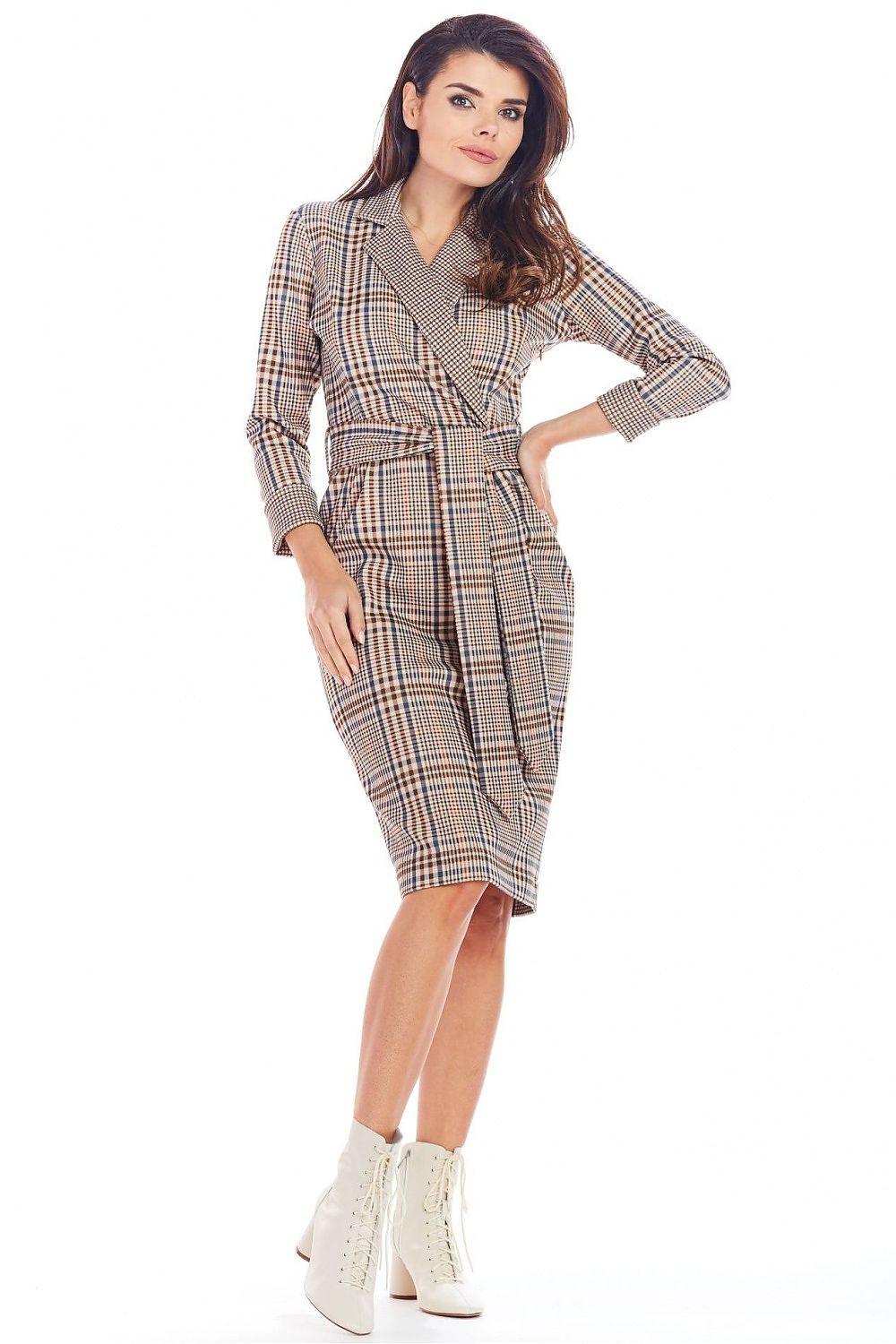 Awama day dress with plaid pattern, long sleeves, button front, and waist belt