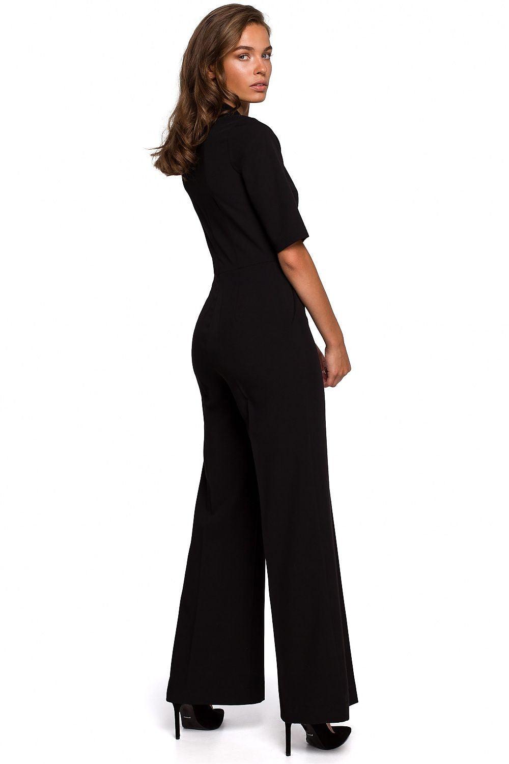 Black short-sleeve jumpsuit with collar and wide-leg trousers, side view