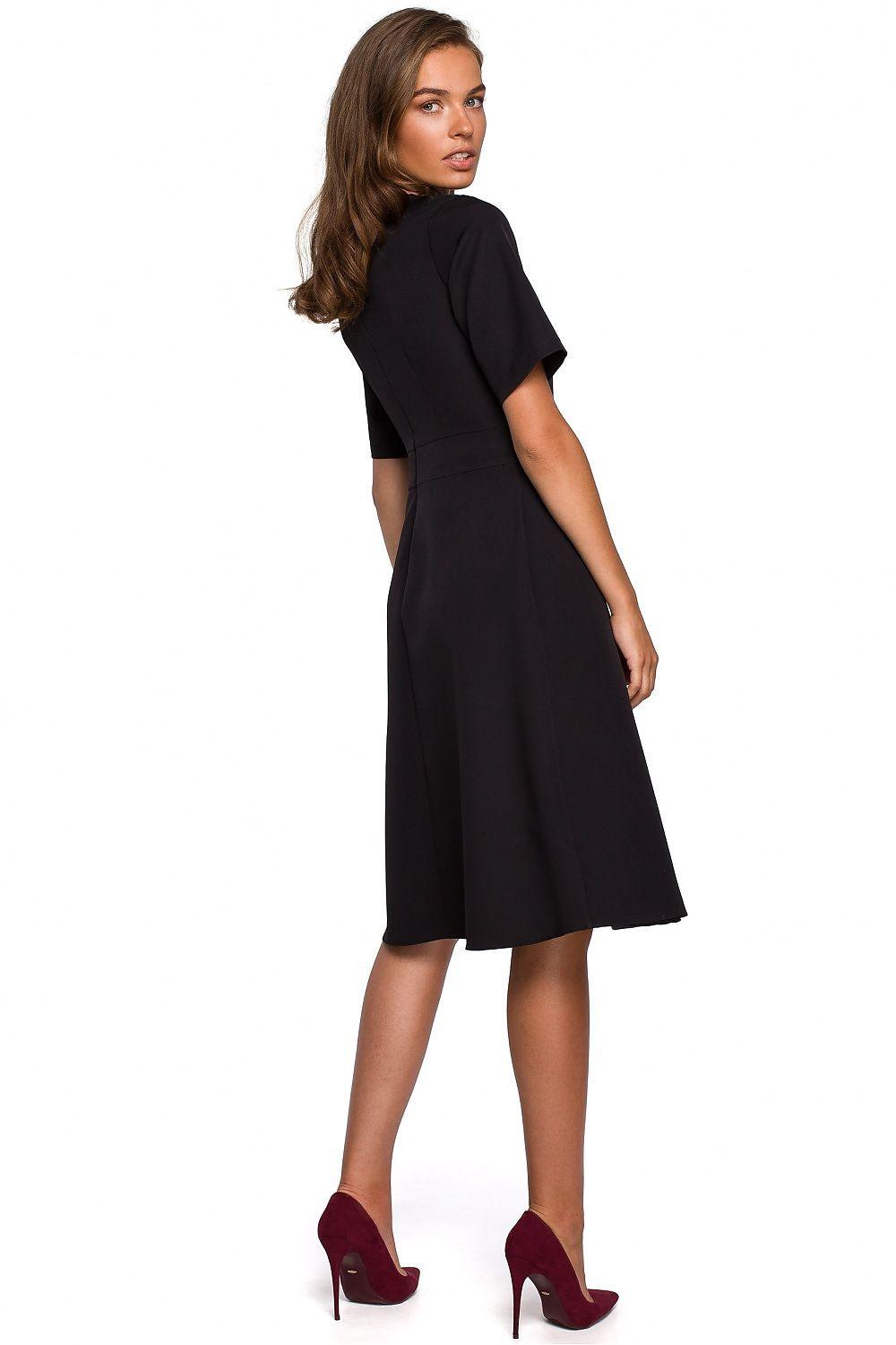 Stylove black daydress, short sleeves, round neck, knee-length, side view