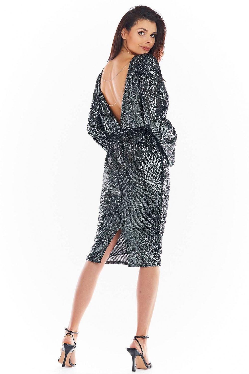 Sequin evening dress with long sleeves, V-back, fitted knee-length and side slit