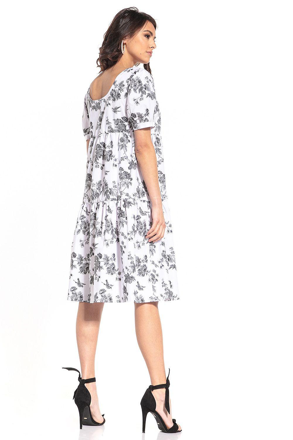 Tessita daydress, white with dark floral print, short sleeves, gathered skirt, open back neckline