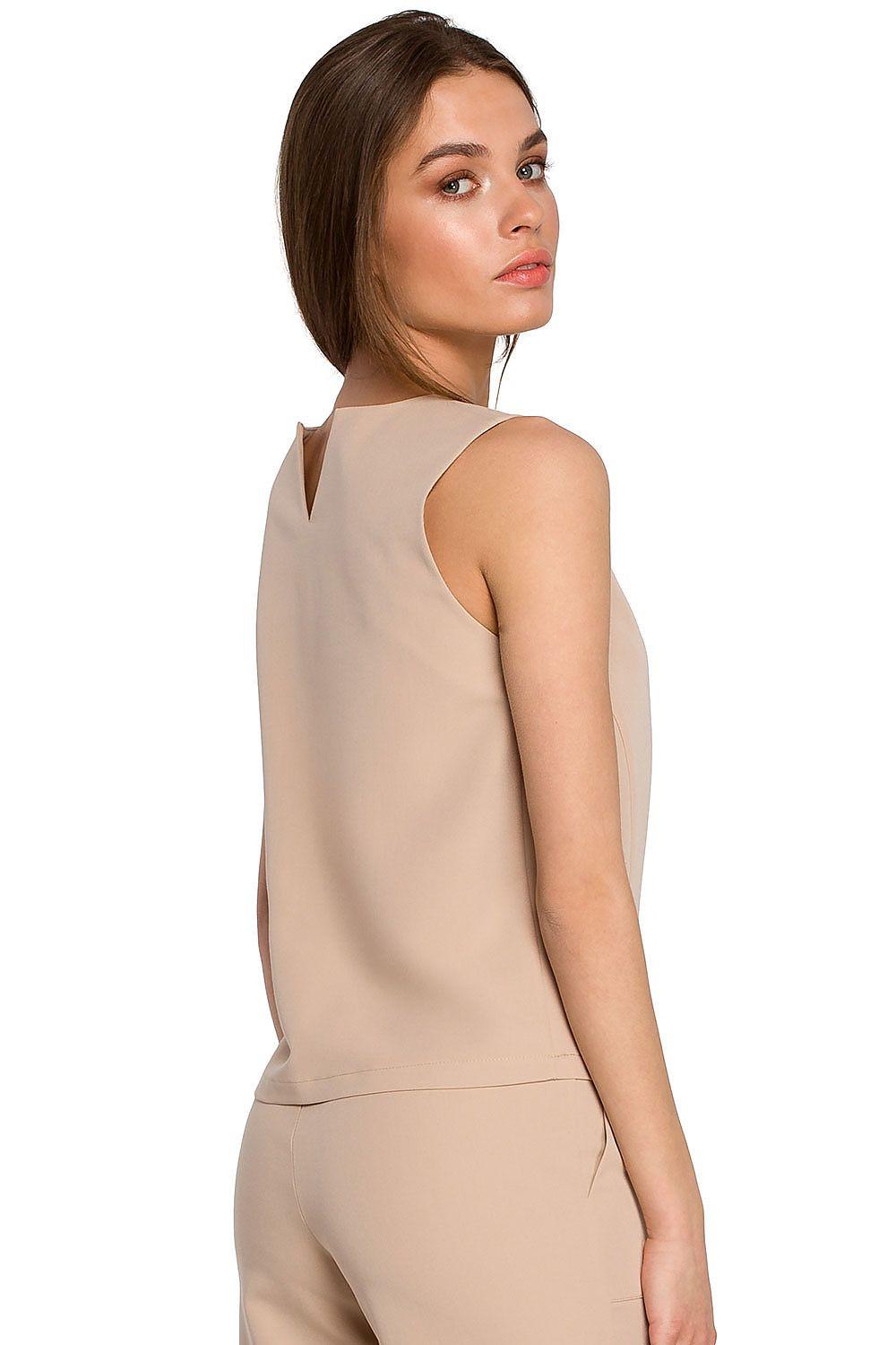 Beige sleeveless blouse with V-back neckline and relaxed fit