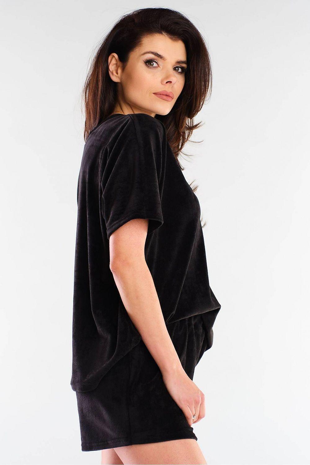 Awama black drawstring shorts with matching V-neck top, side view