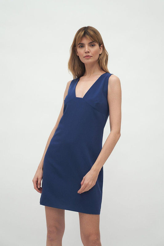 Navy blue sleeveless daydress with V-neck and straight, knee-length skirt