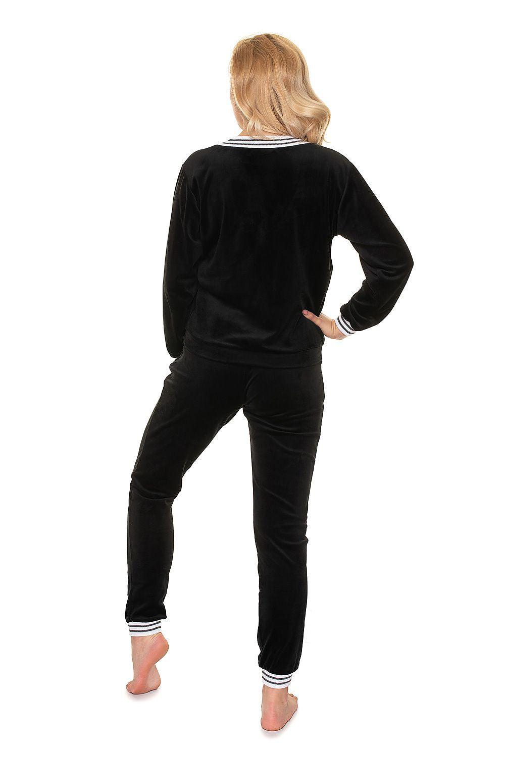Black velour tracksuit set, back view long-sleeve top with striped cuffs and joggers