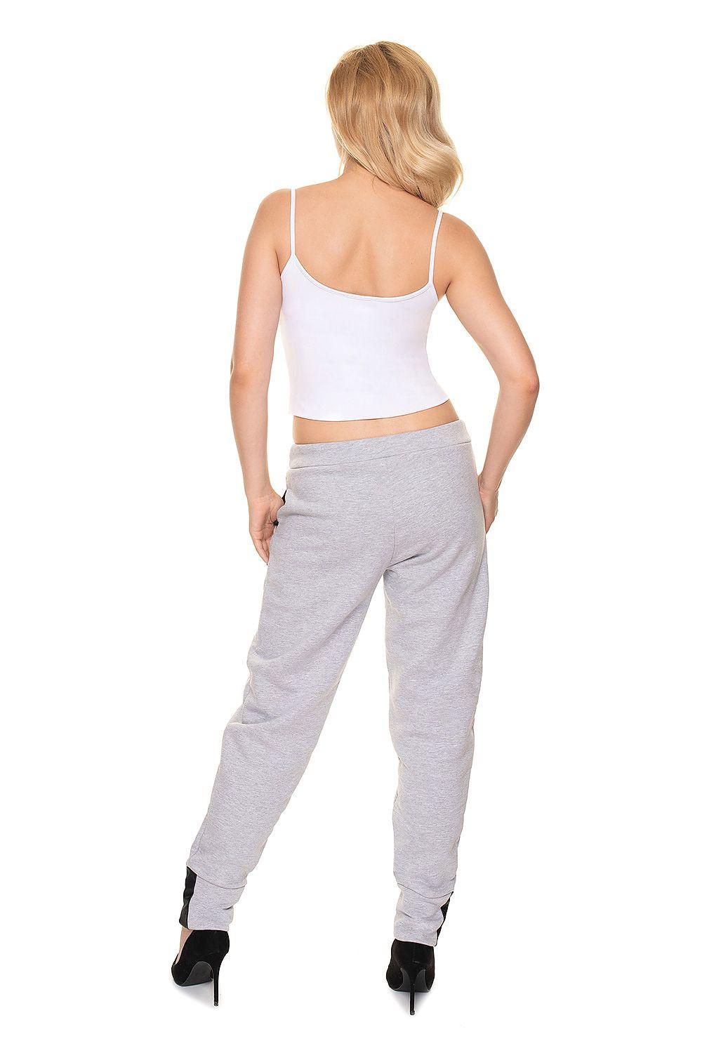 Tracksuit trousers in light heather grey, back view, drawstring waist and tapered legs