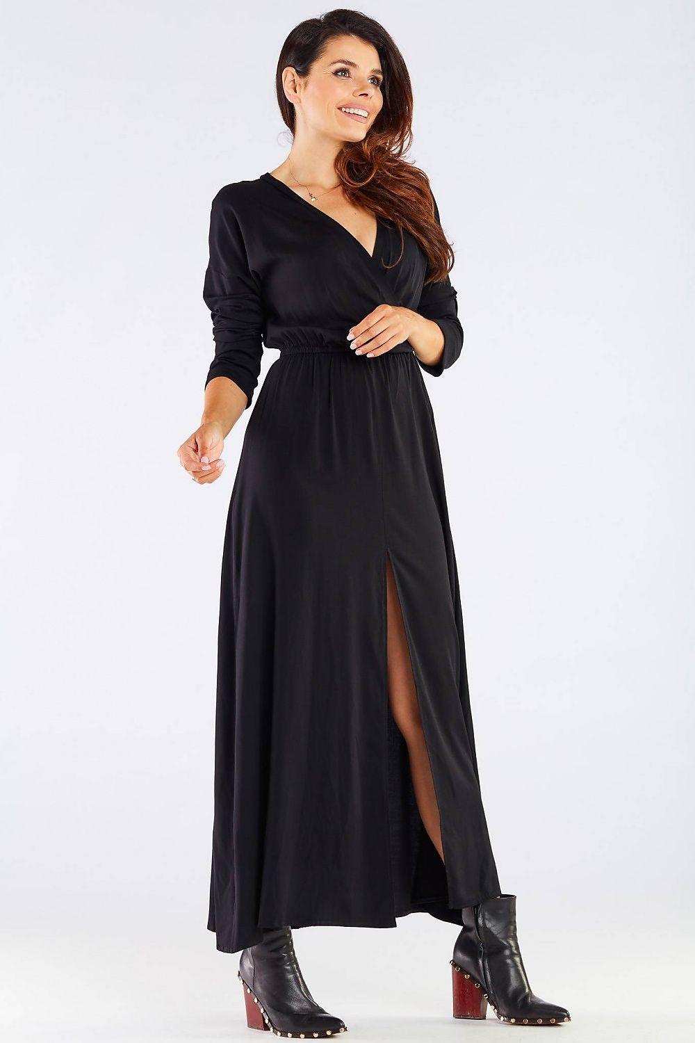Black wrap daydress with V-neck, long sleeves, waist tie, and side slit (front view)