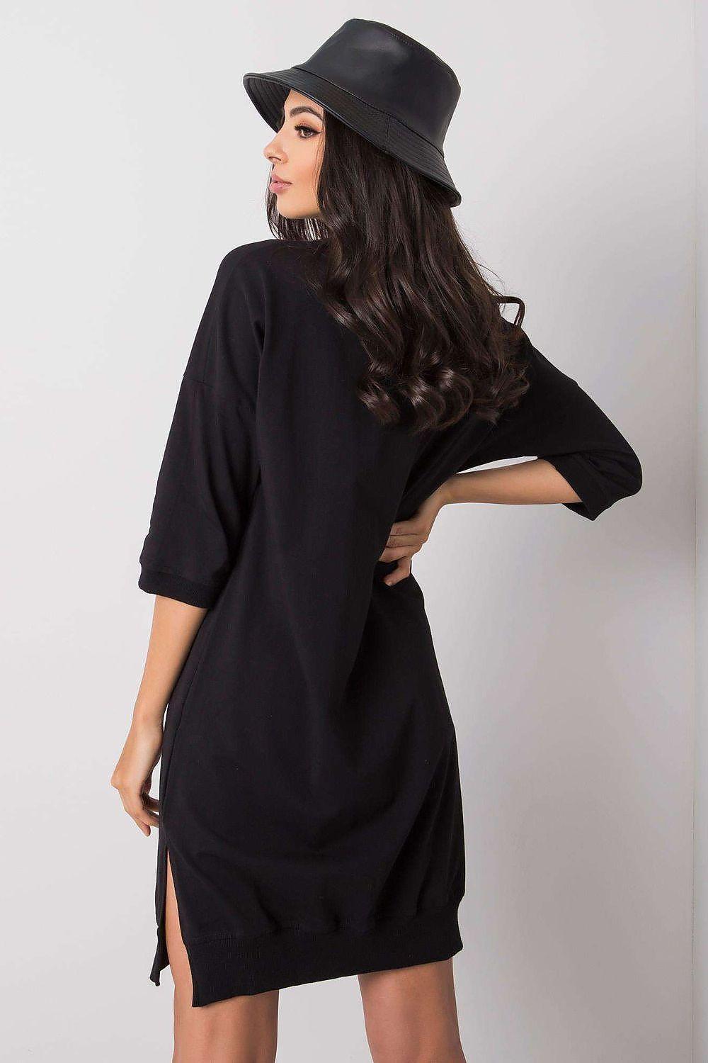 Black hooded daydress with drawstring ties and three-quarter sleeves, back view