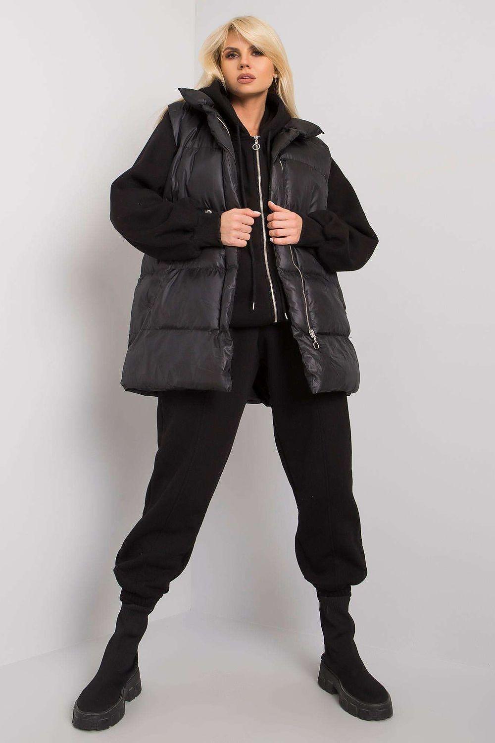 Black puffer vest and hoodie set with zip-up front, hooded design