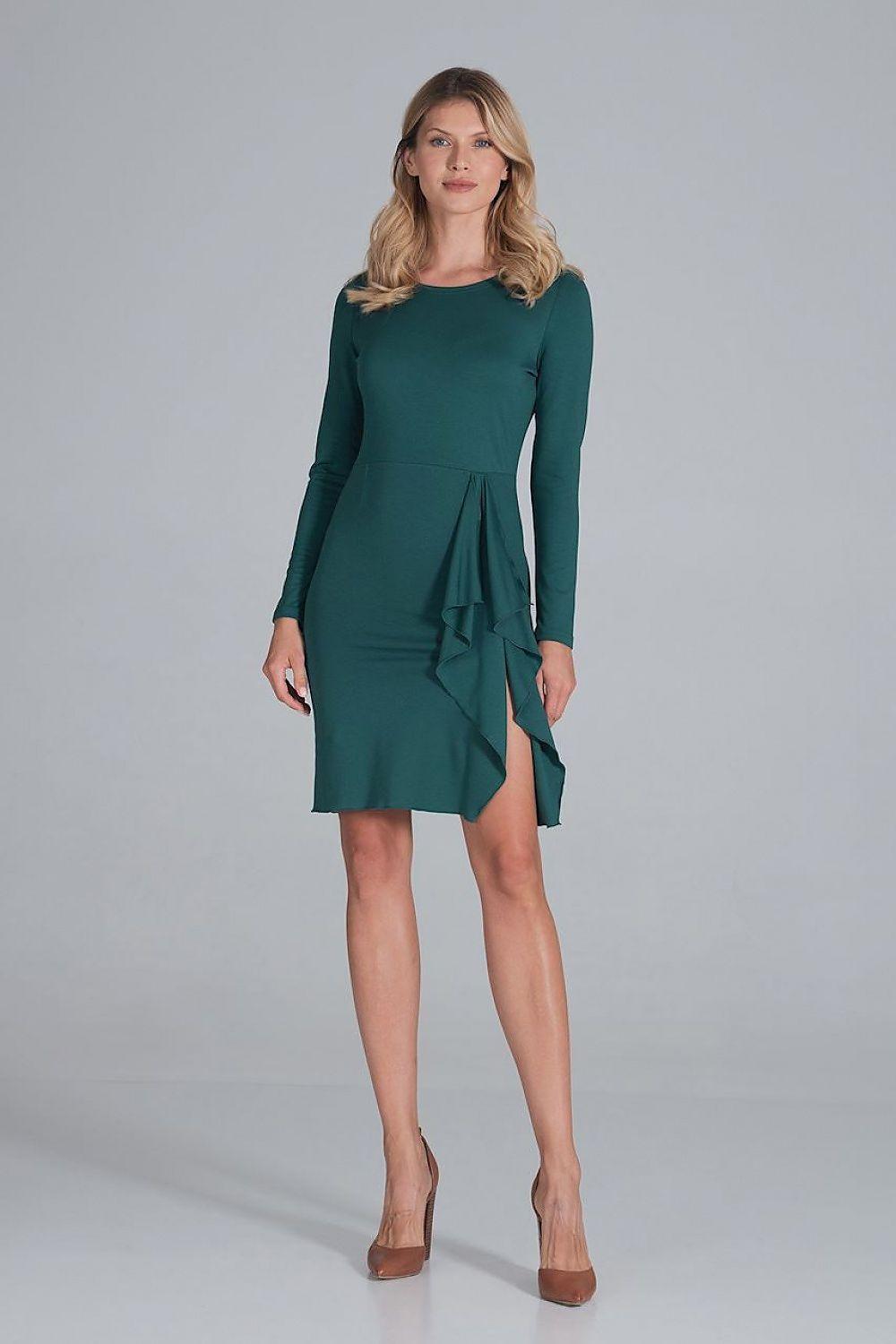 Green cocktail dress with long sleeves, draped waist detail and asymmetrical hem