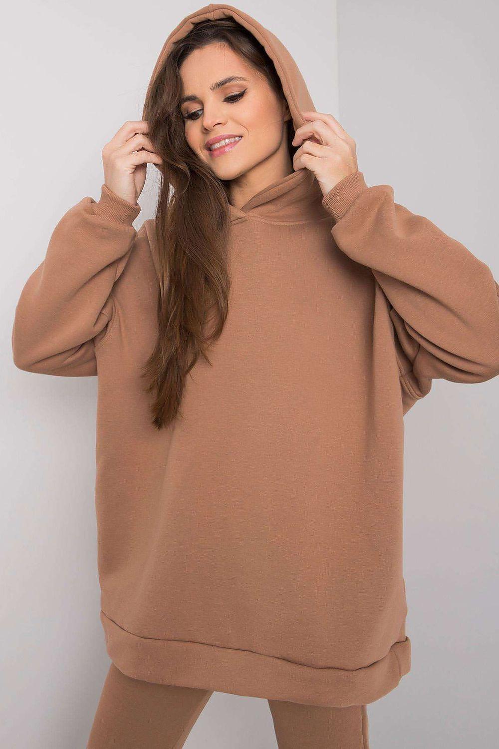Tan hoodie and jogger set with hood up and kangaroo pocket, front view