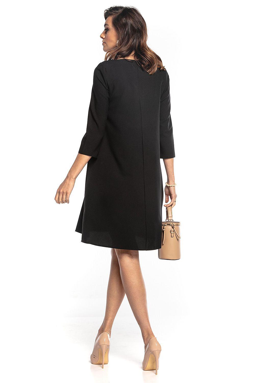 Black V-neck daydress with 3/4 sleeves and waist belt, back side view