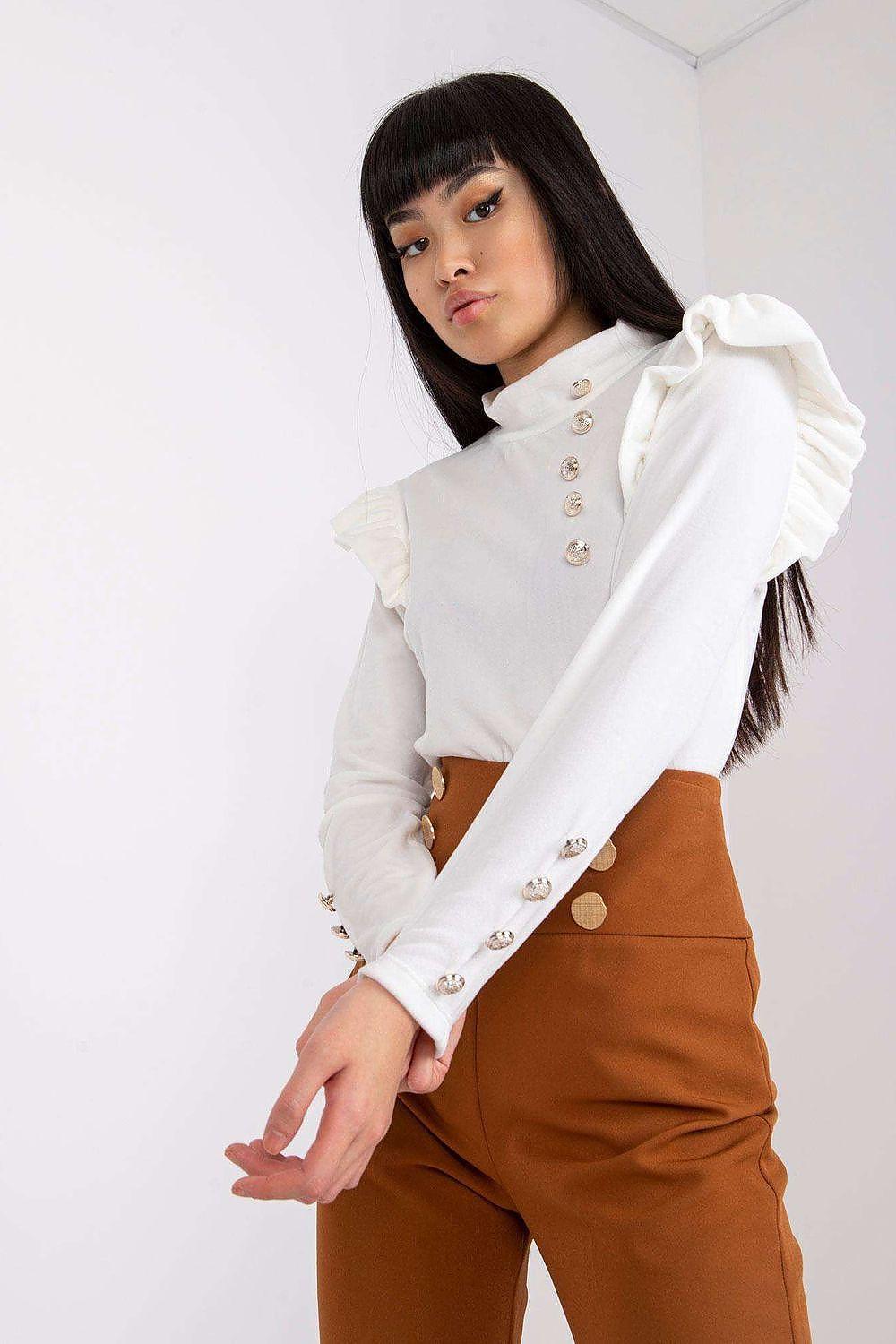 White long-sleeve blouse with ruffled cuffs and front buttons