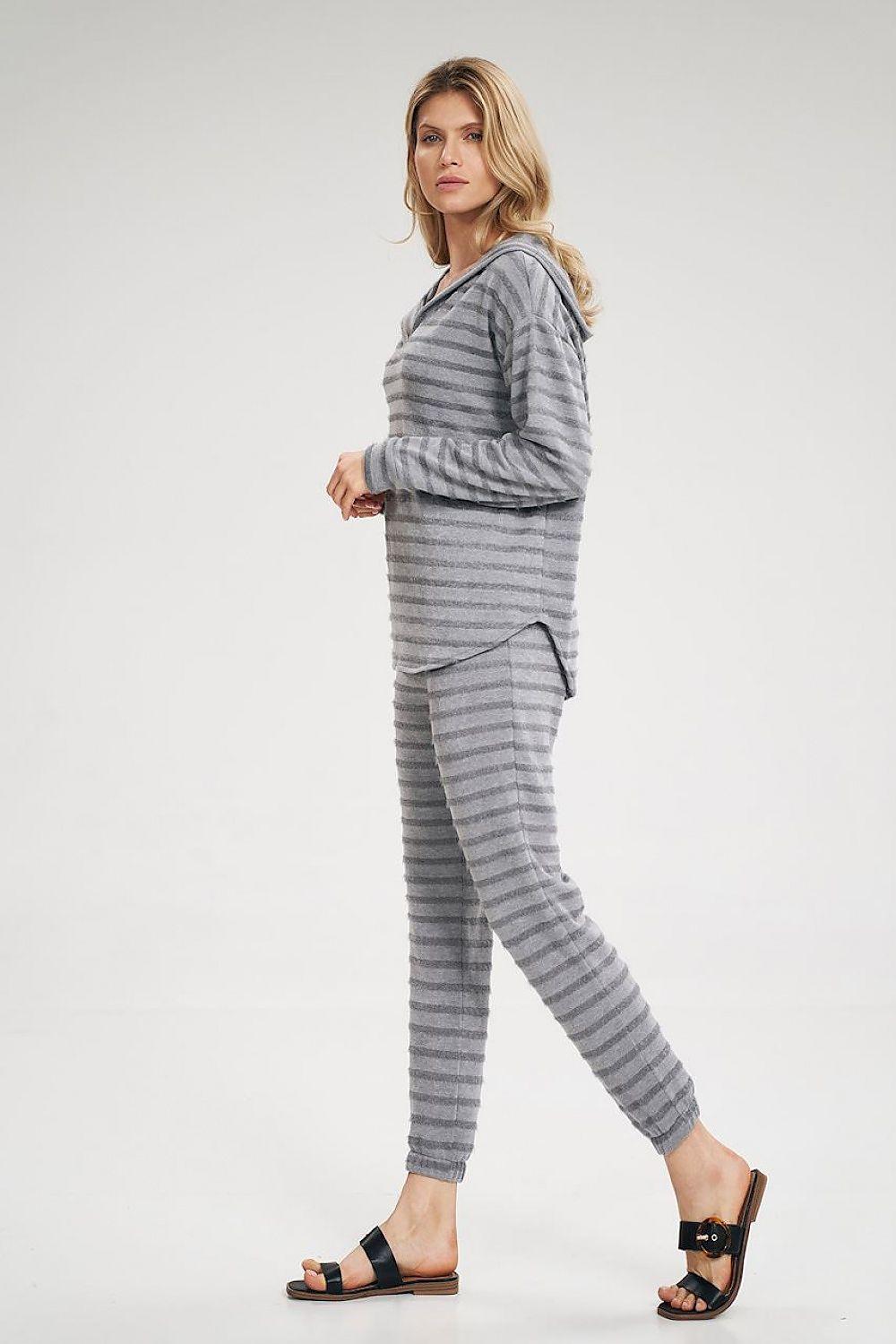 Striped tracksuit trousers in grey, side view with tapered ankle cuffs