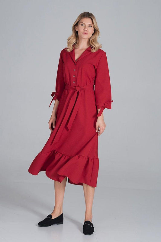 Red maxi daydress with gathered waist, long sleeves with tied cuffs and flared skirt