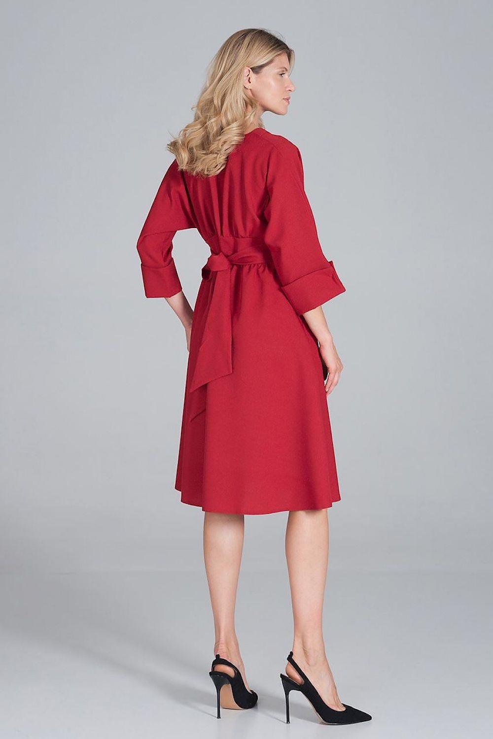 Red daydress with belt tie at waist and 3/4 sleeves