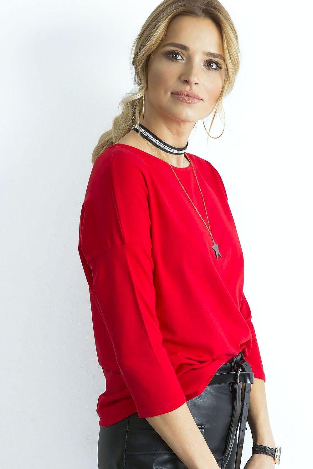 Red blouse with scoop neck and three-quarter sleeves, close side view