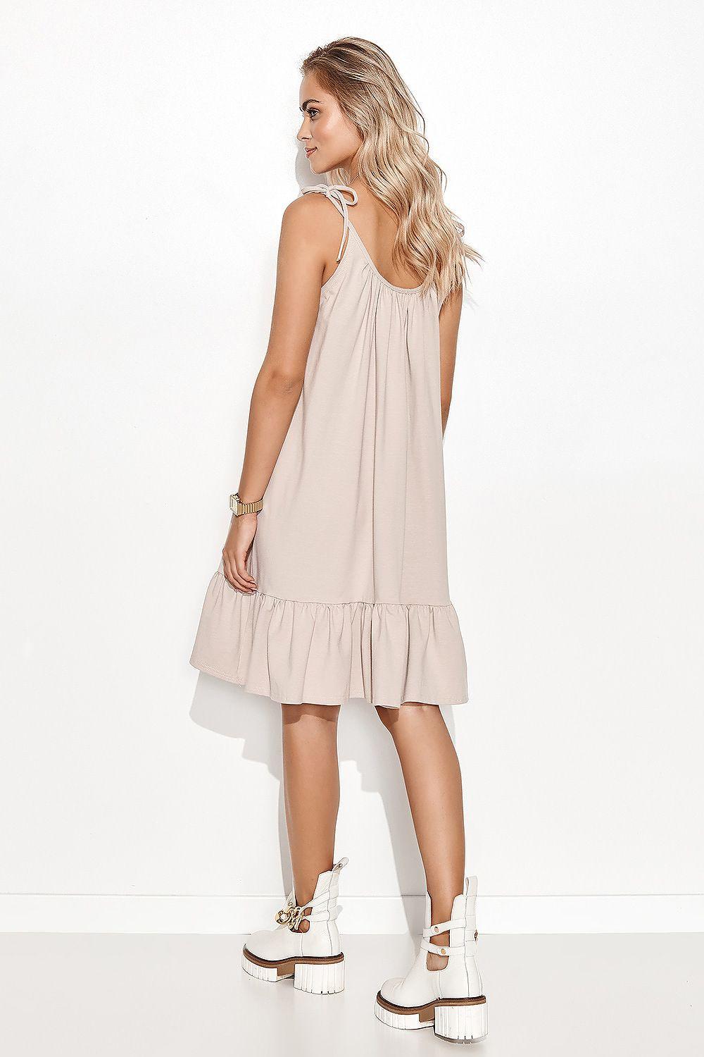 Beige sleeveless day dress with spaghetti straps and tiered ruffle skirt, side view