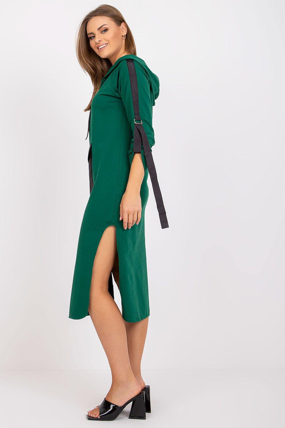 Green hooded daydress with front zipper and side slit, ribbon-tie detail.