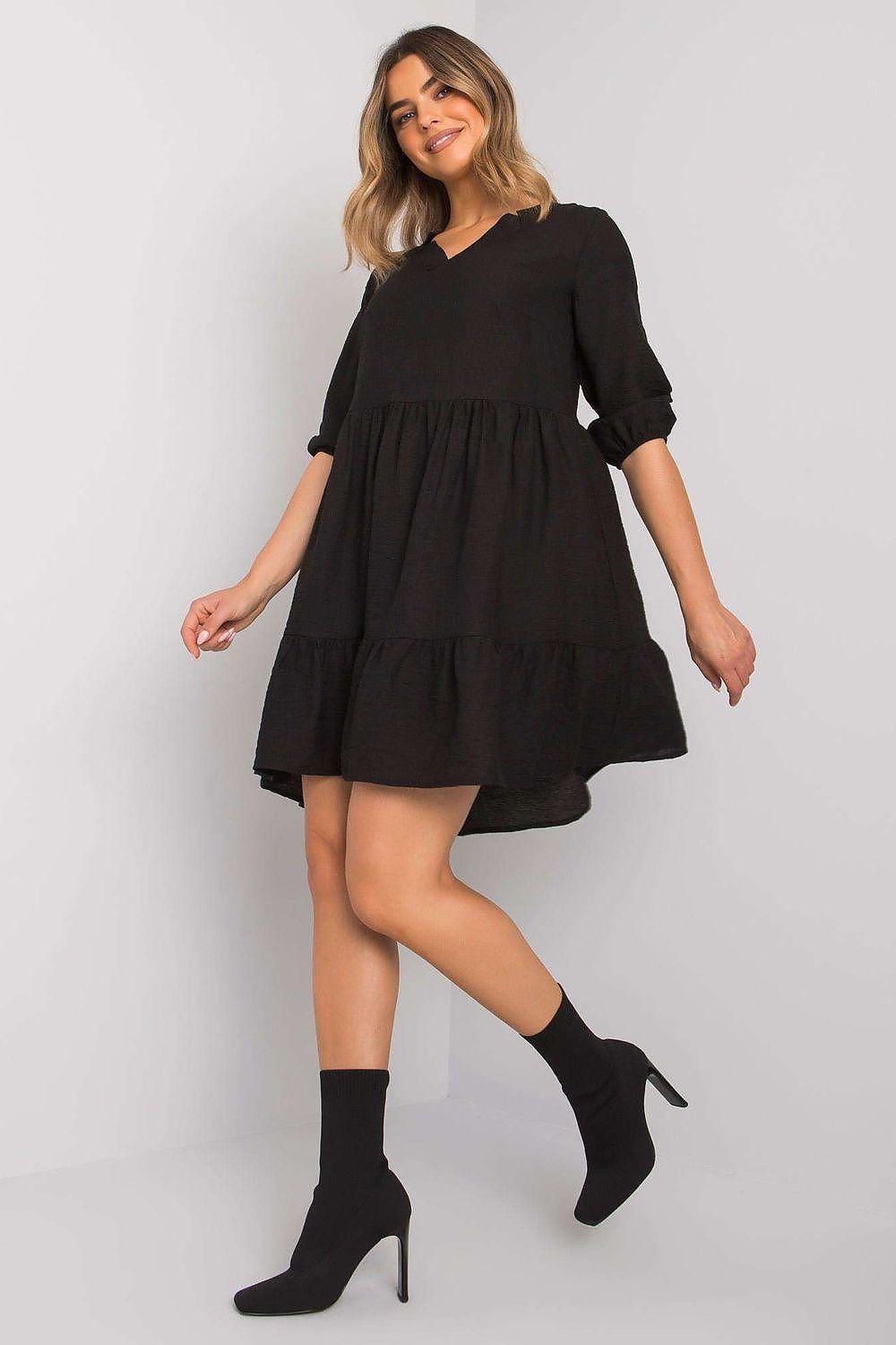 Black tiered above-knee daydress with V-neck, gathered waist and three-quarter sleeves