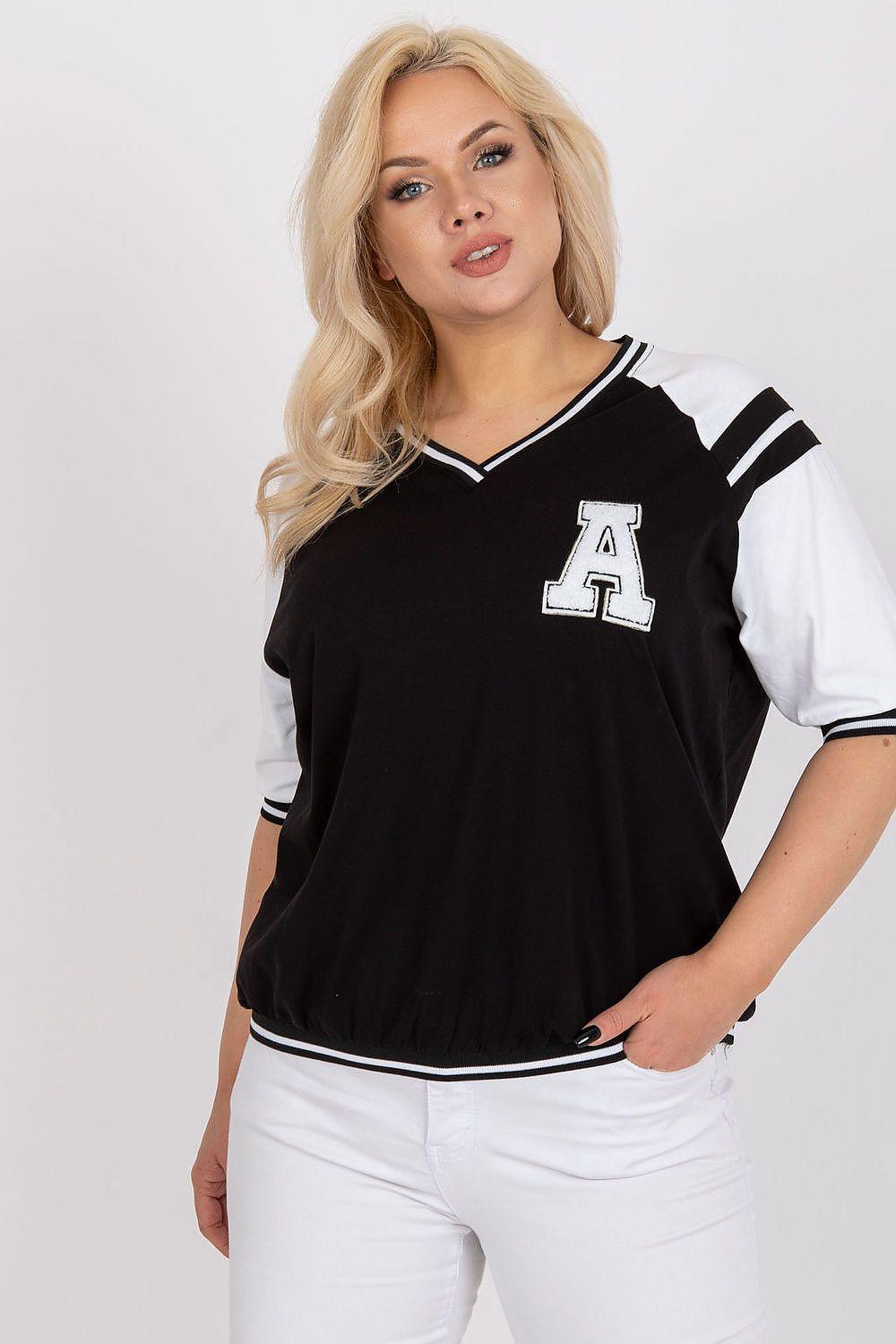 Black blouse with white striped sleeve cuffs and letter A patch