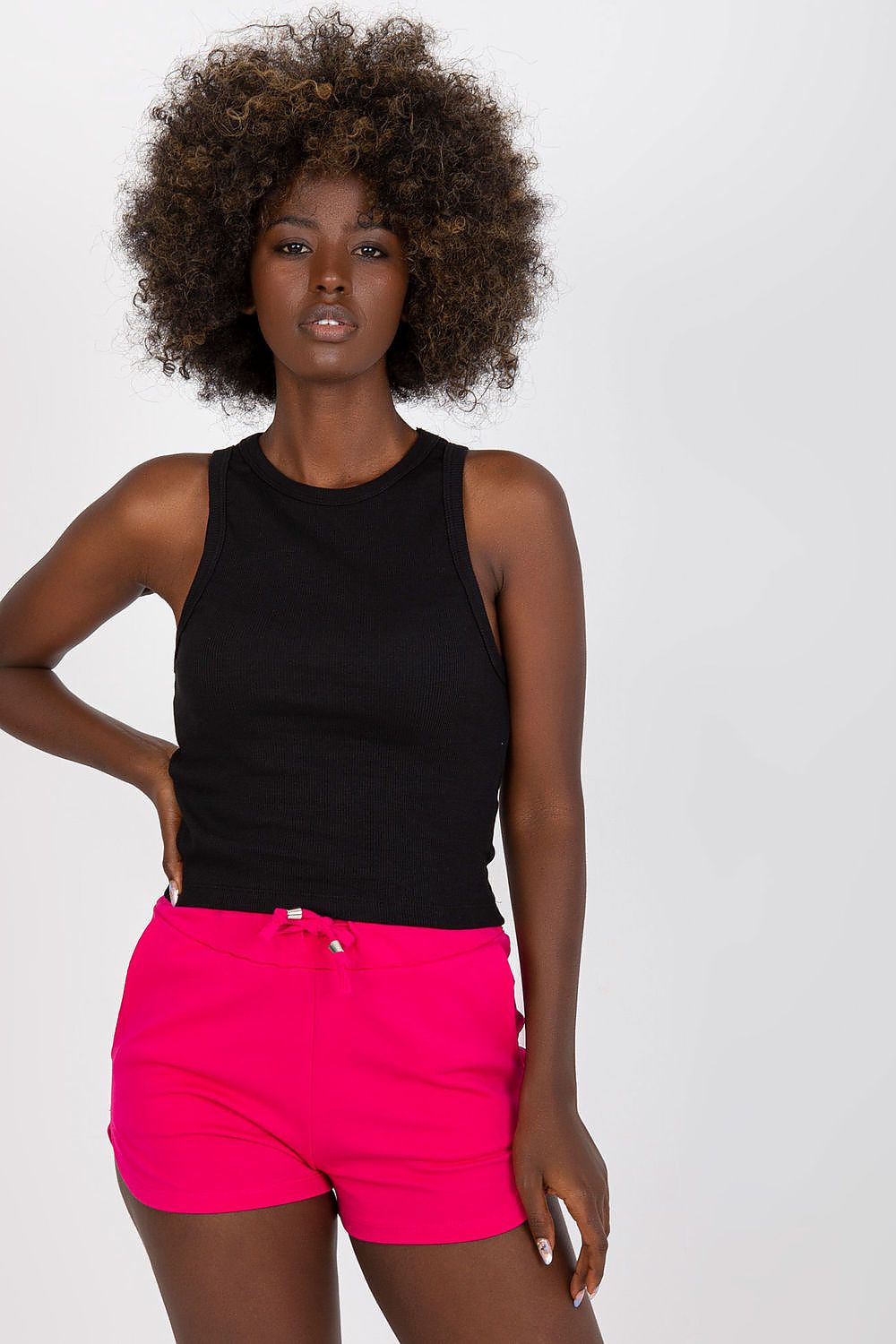 Black ribbed sleeveless top with high neckline