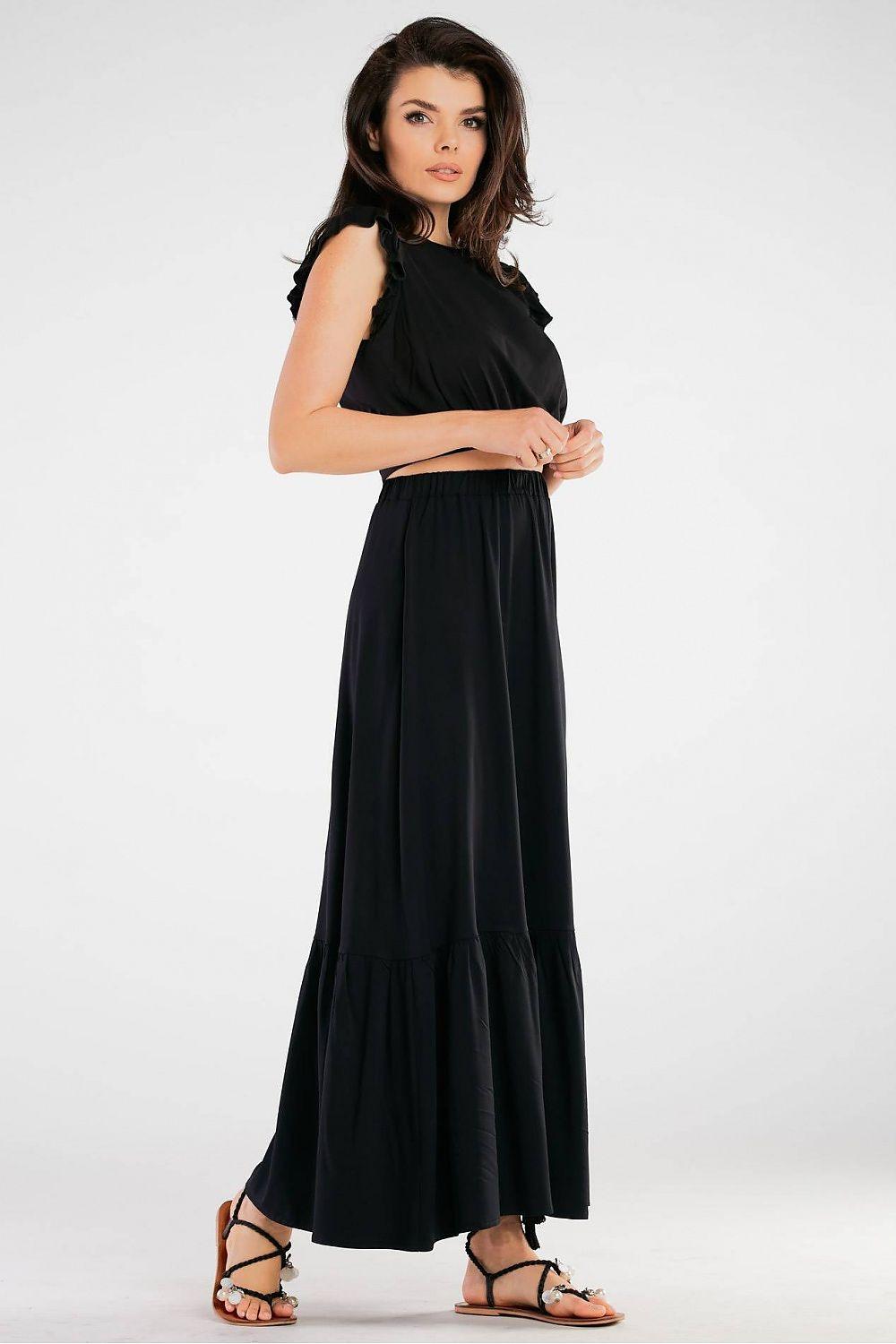 Black midi blouse with ruffled sleeves, fitted waist and flowing skirt