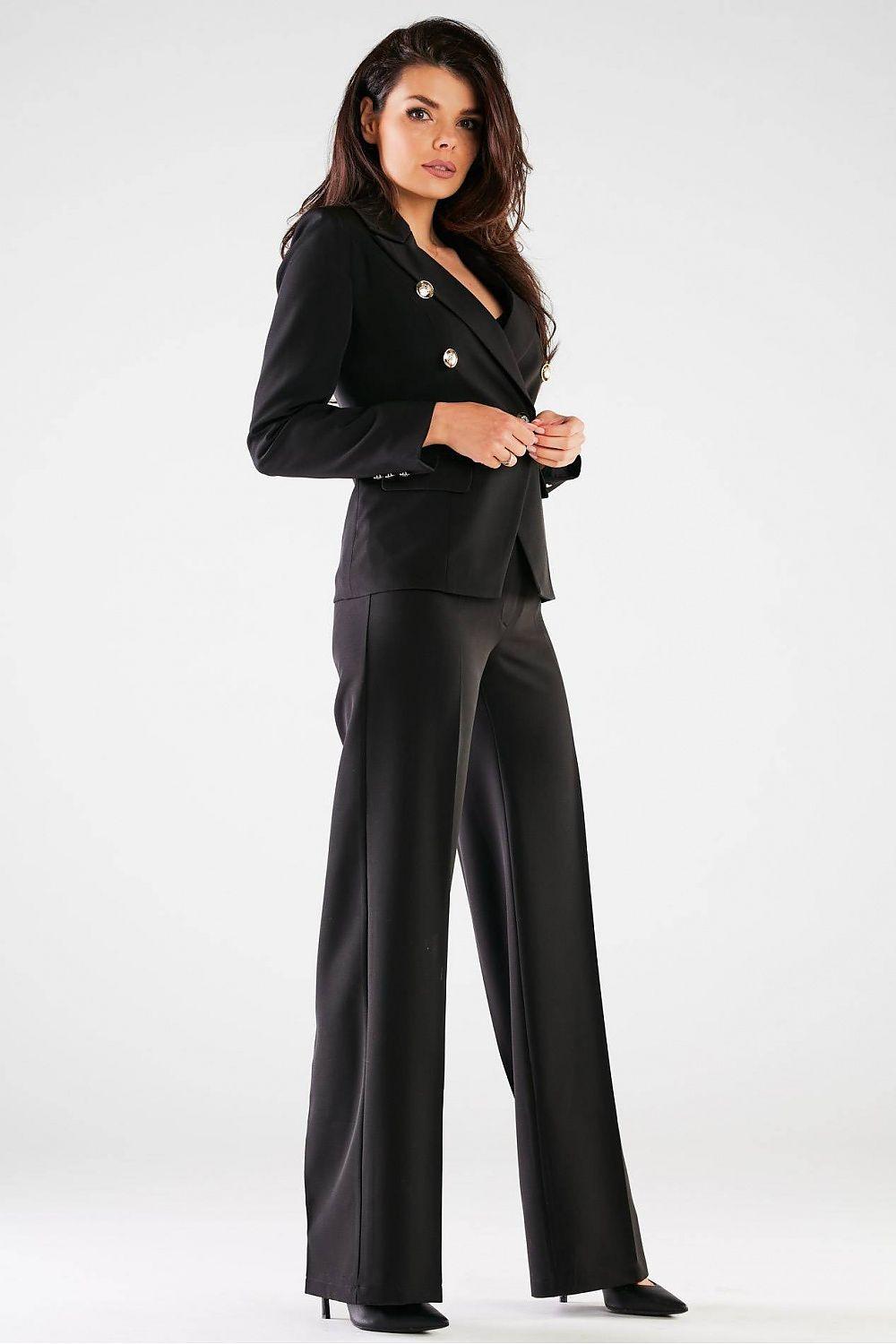 High-rise black wide-leg trousers with long wide leg opening and smooth, tailored fit.