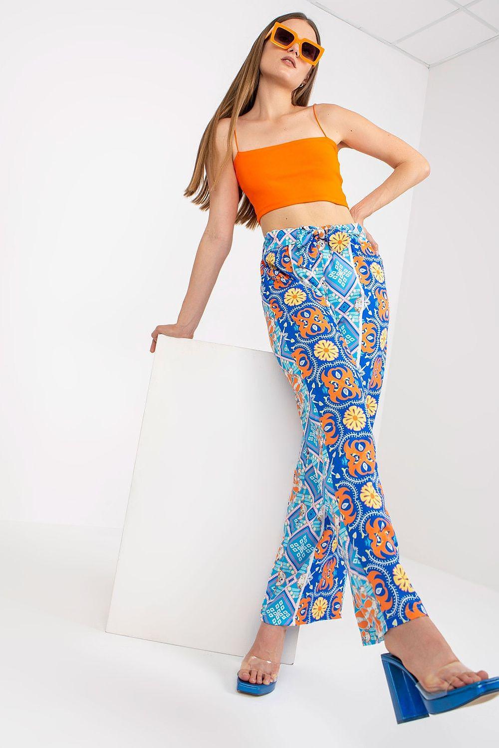 Women’s wide-leg trousers in blue with orange medallion print and flared hem