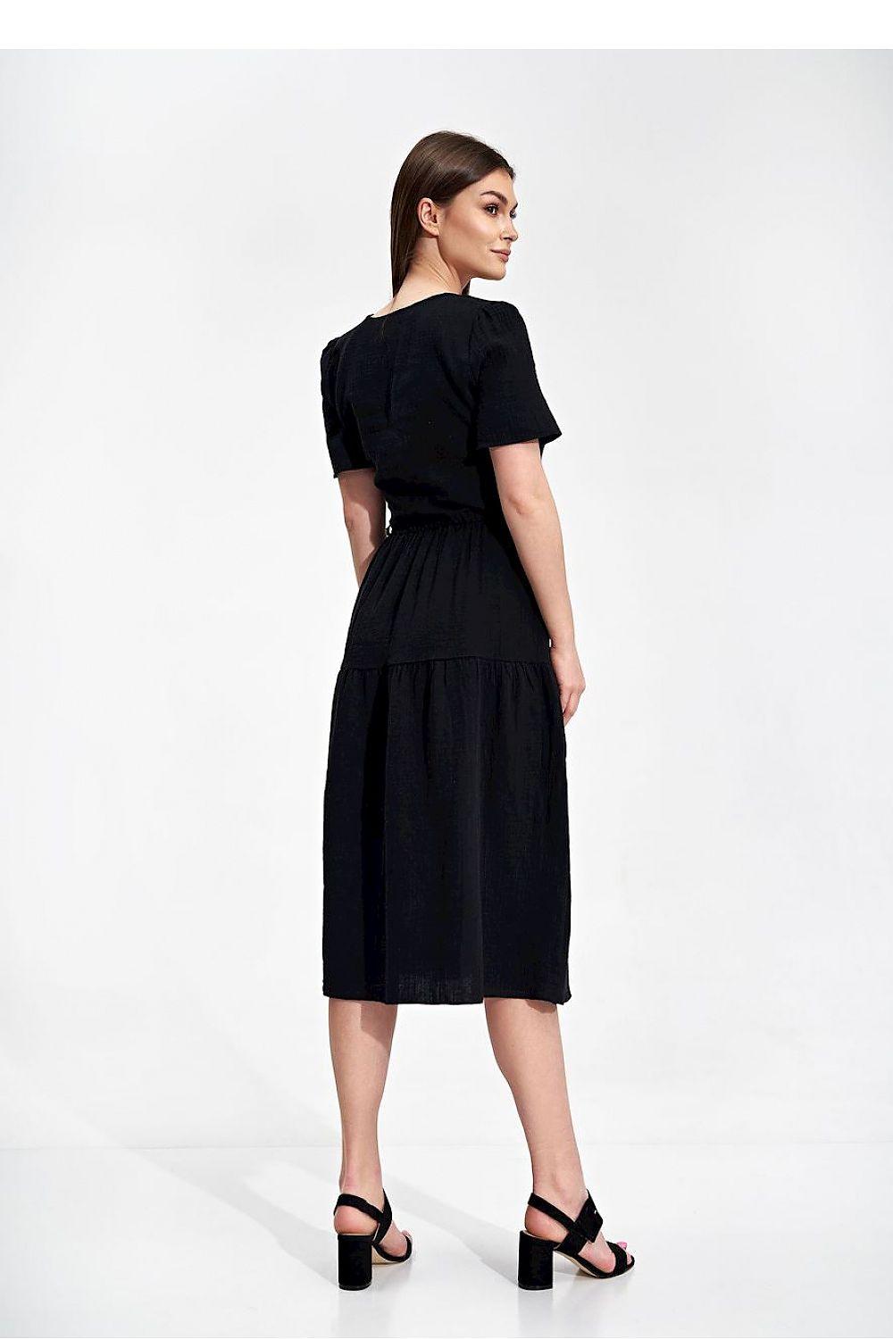 Black daydress back view, short sleeves, gathered waist and tiered midi skirt