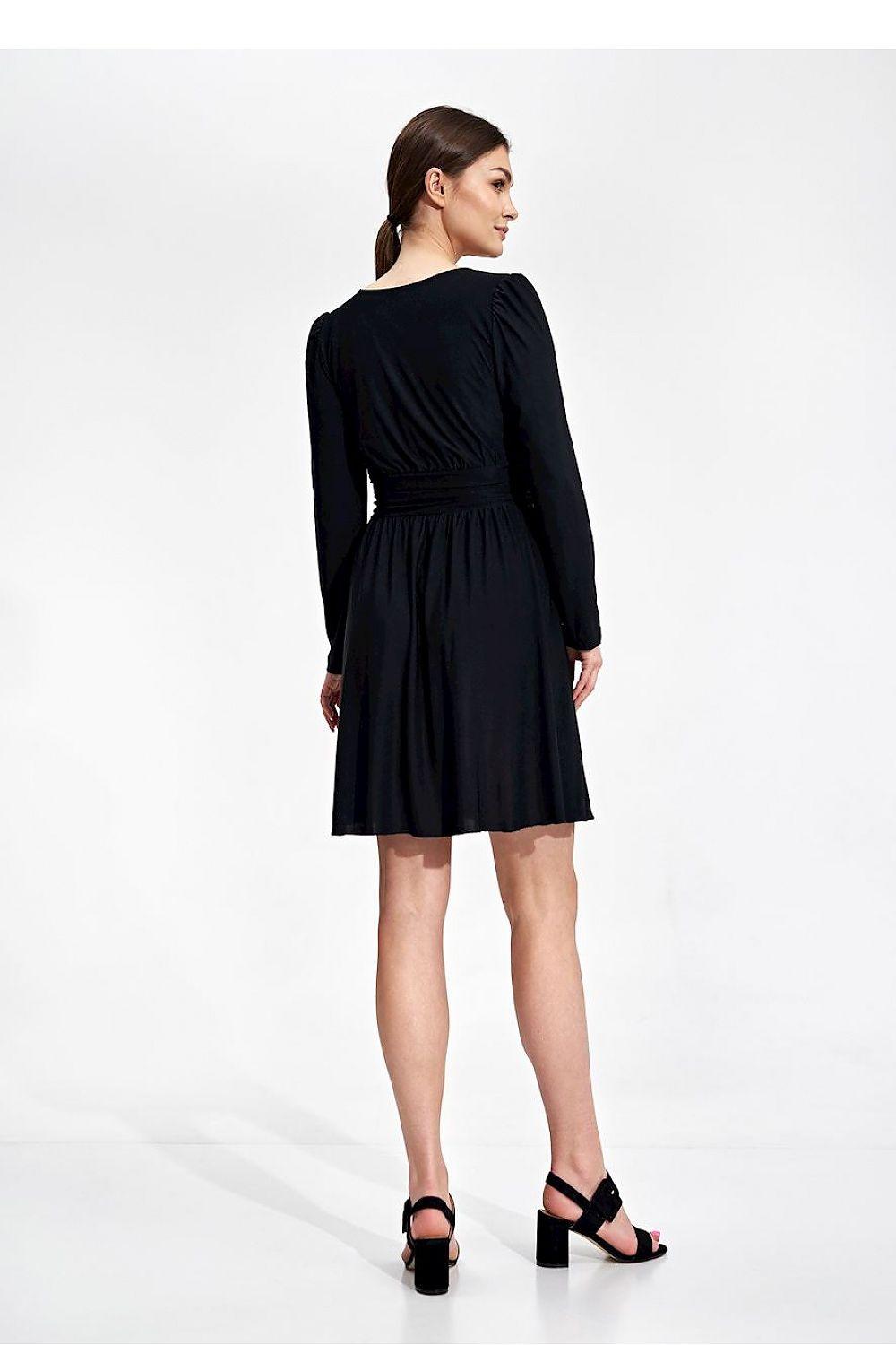 Black daydress by Figl, back view: long sleeves and gathered waist, flared knee-length skirt.