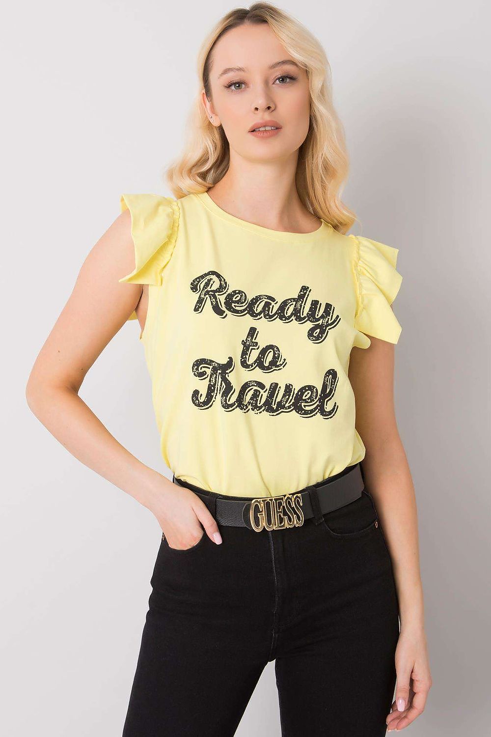 Yellow short-sleeve blouse with frill sleeves and "Ready to Travel" graphic