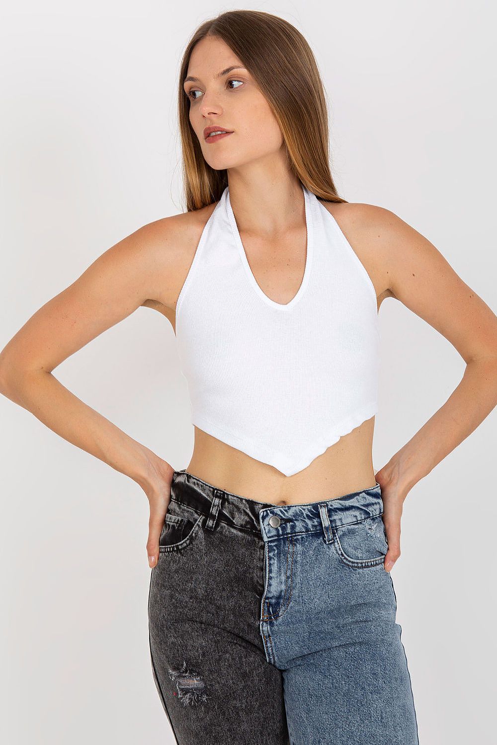 White ribbed halter crop top with sleeveless V-neck and cropped hem