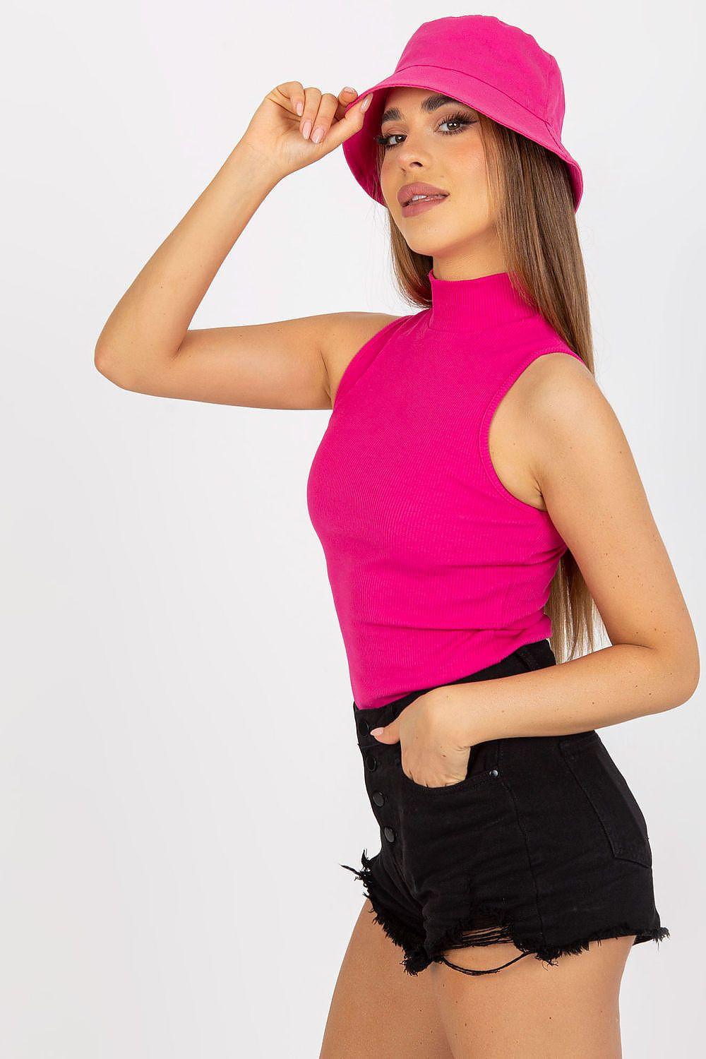 Pink sleeveless high-neck top, side view