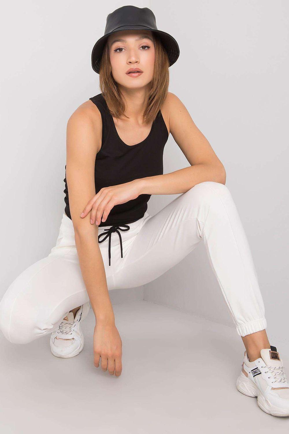 Women’s trousers, light beige drawstring waist with tapered legs and ankle cuffs