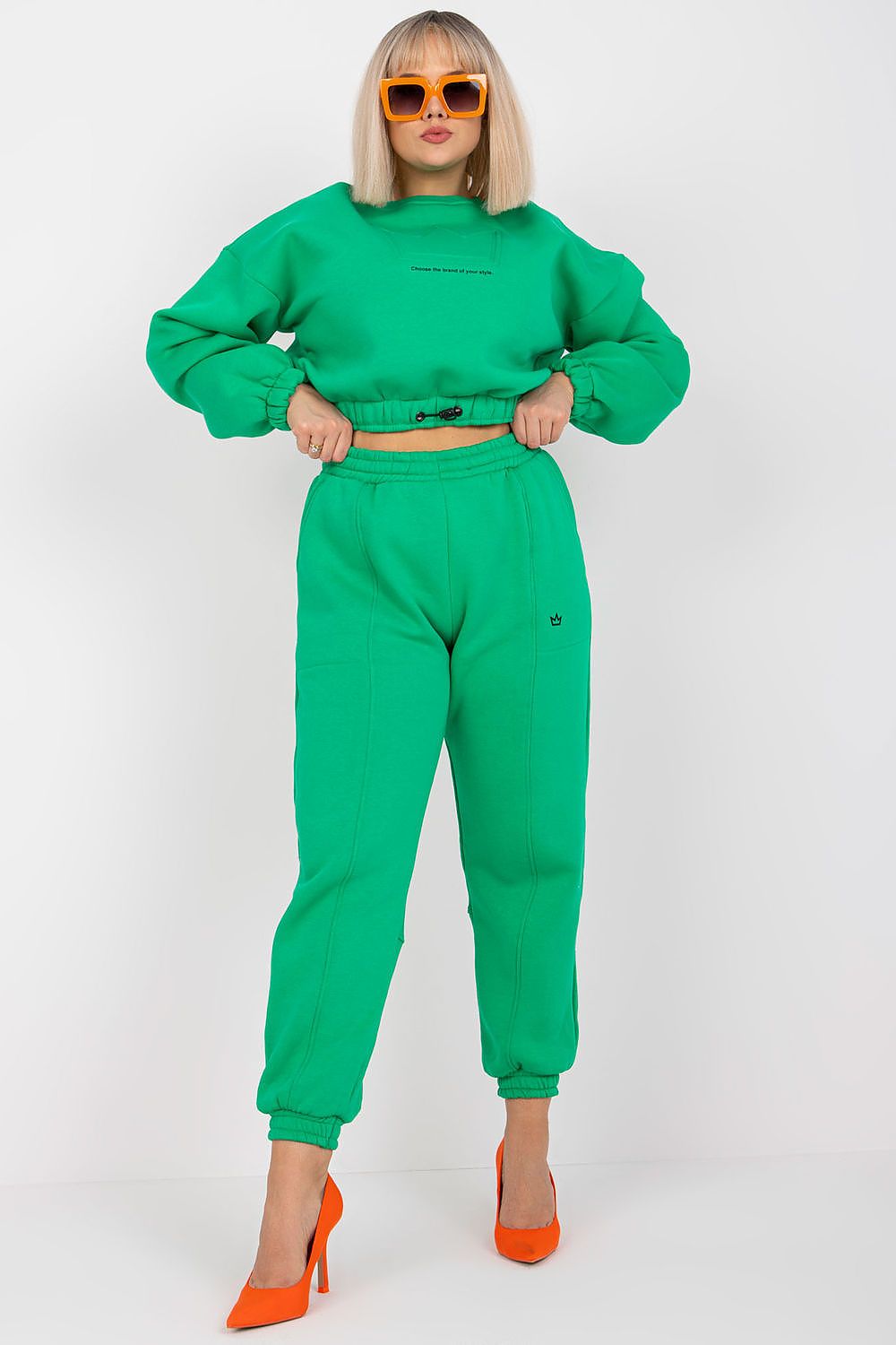 Green sweatshirt and jogger pants set with cropped crewneck and cuffed hems