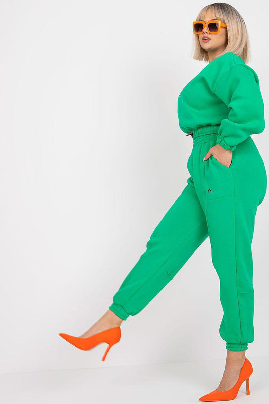 Ex Moda green two-piece set: cropped sweatshirt with jogger pants, side view.