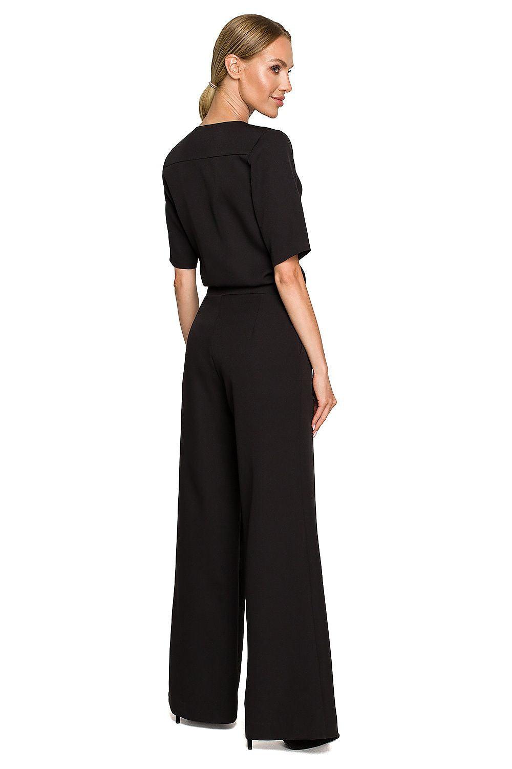 Women’s black back view pantsuit with short sleeves and wide-leg trousers