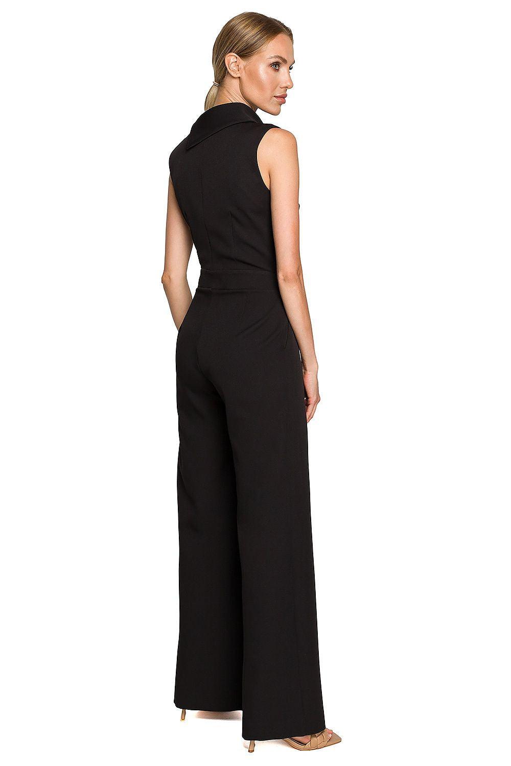 Back view of sleeveless high-neck jumpsuit in black with wide-leg trousers
