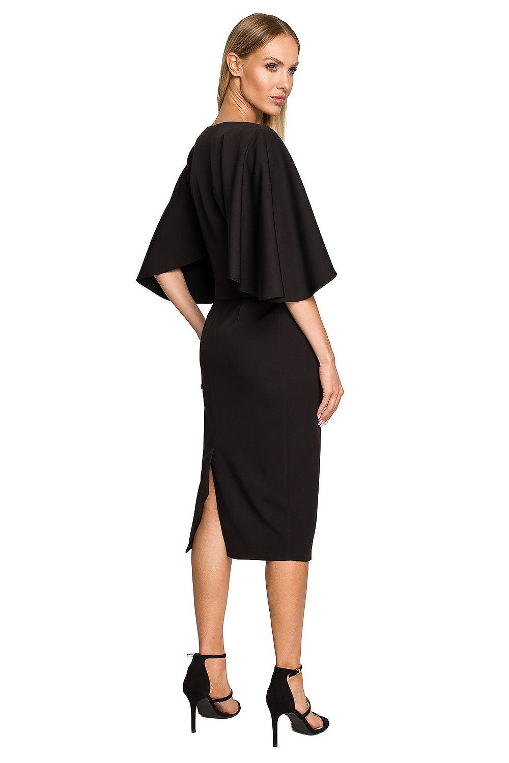 Black cocktail dress with ruffled cape sleeves, fitted midi length, side view