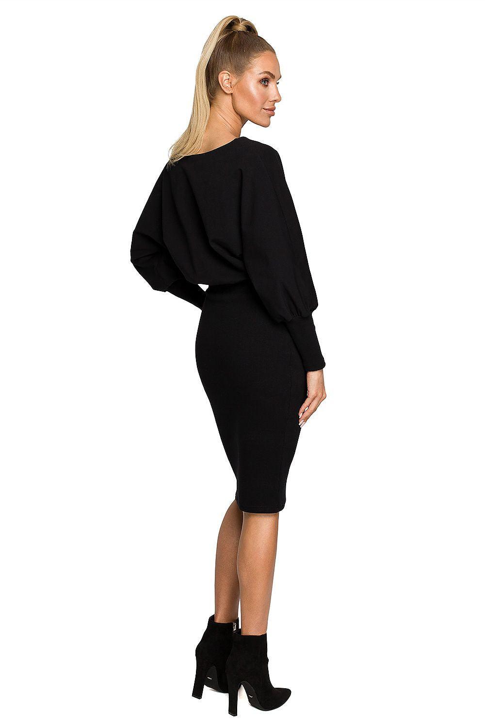 Black daydress with long puff sleeves and fitted midi skirt, back view