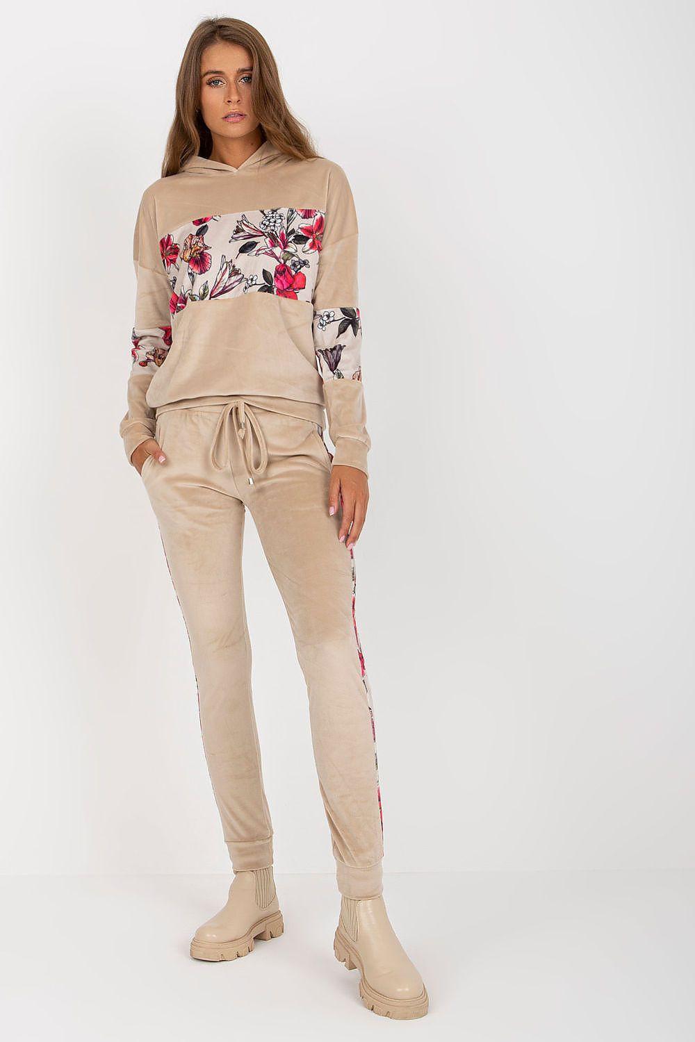 Beige hoodie and matching jogger set with floral chest panel and side stripes.