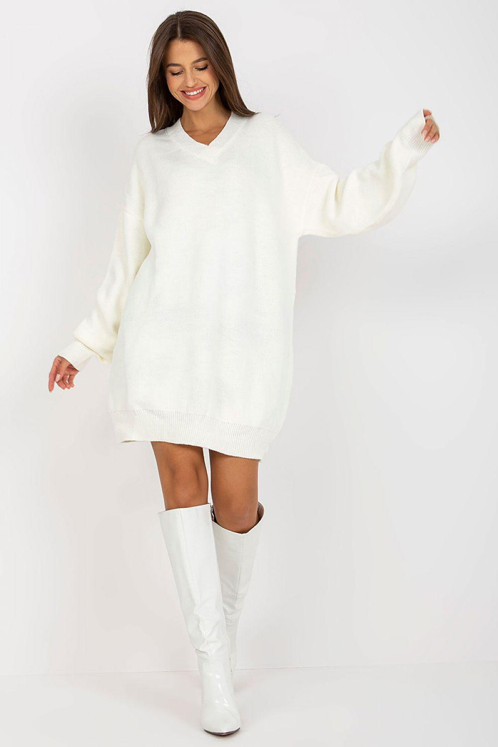 White knit daydress with long sleeves and V-neck, above-knee length